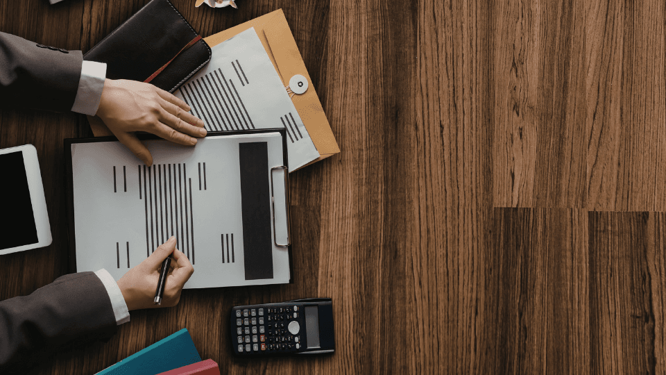 Image of documents being written on a desktop