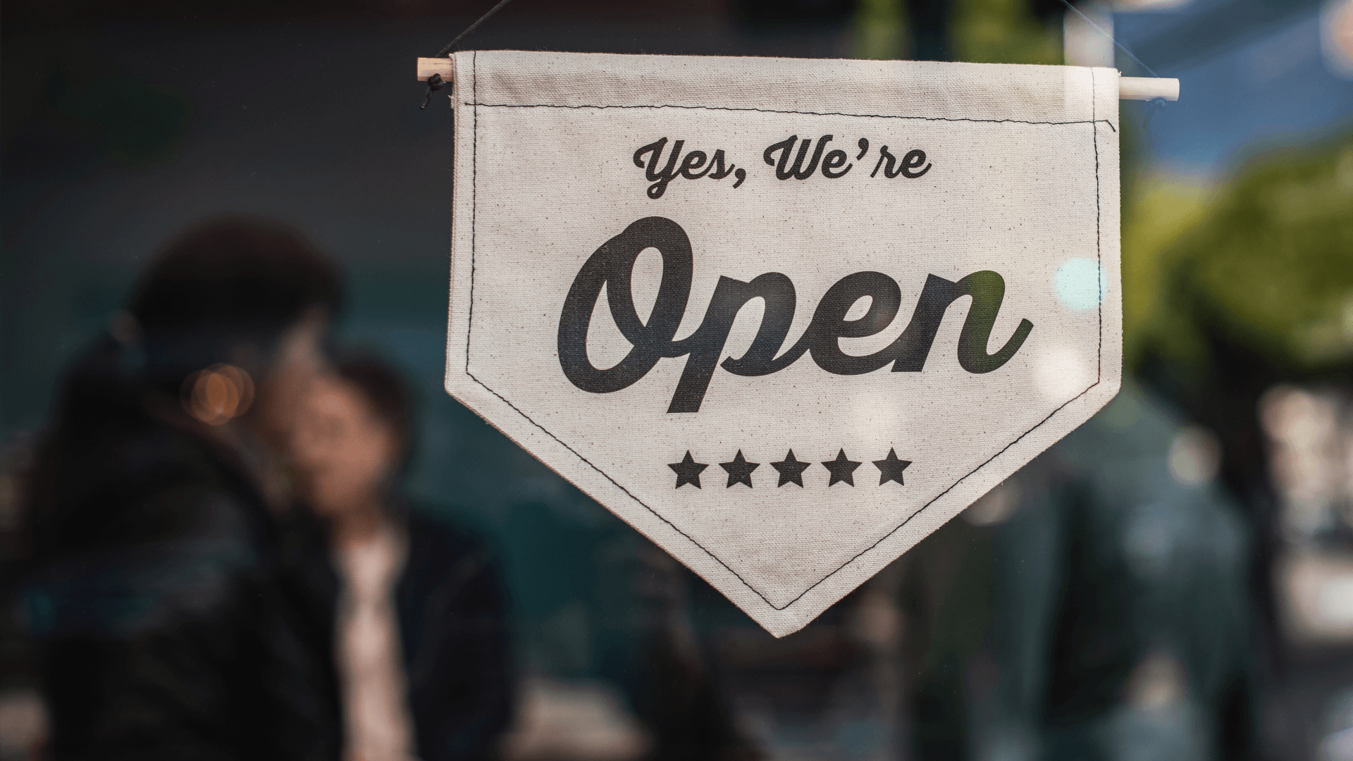 Image of an open for business sign 