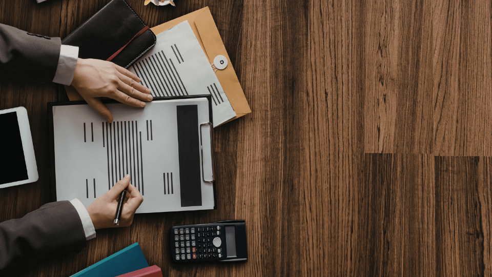 Image of documents being written on a desktop